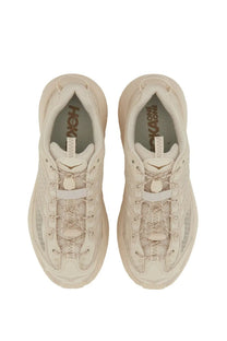 Beige hoka unisex mafate three2 running shoes with mesh and synthetic overlays and a chunky midsole