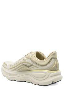 Beige hoka one one bondi 8 running shoe with textured mesh upper and thick cushioned sole in hoka unisex sneaker bondi green