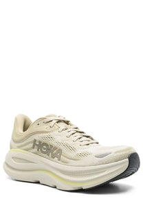 Beige hoka unisex sneaker bondi green with mesh upper and thick cushioned sole for comfortable running