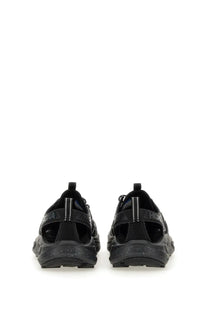 Hoka unisex sneaker hopara black chunky sneakers with speckled rubber sole and textured straps front view