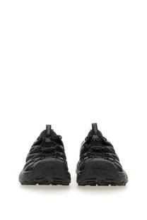 Black hoka one one clifton 8 trail running shoes with textured upper and rugged sole in hoka unisex sneaker hopara black