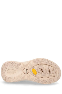 Beige hoka unisex sneaker mafate speed pink hiking shoe sole with yellow vibram outsole and megagrip branding