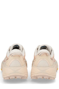 Cream-colored hoka one one mafate speed pink unisex sneaker with textured layered design and pink accent stitching