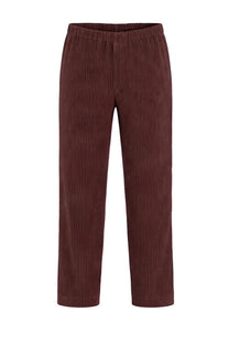 Homme Plisse Issey Miyake men’s pantalon plissettato brown burgundy corduroy trousers with relaxed straight leg and elastic waistband