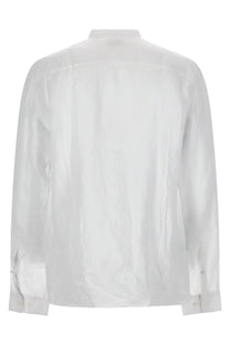 Hugo Boss men’s crisp white long-sleeved button-down shirt in lino with subtle textured weave and classic collar