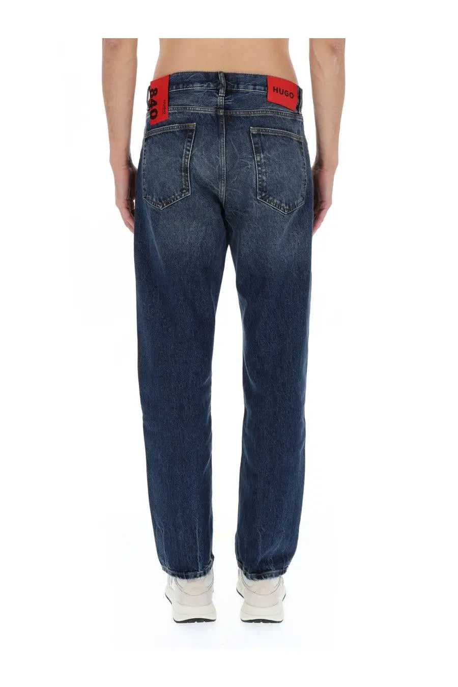 Dark blue cotton denim jeans with a red waistband featuring the hugo brand logo by hugo boss men