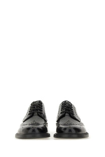 Hugo Boss men’s leather derby loafer black with patent leather brogue oxford design and intricate perforated detailing