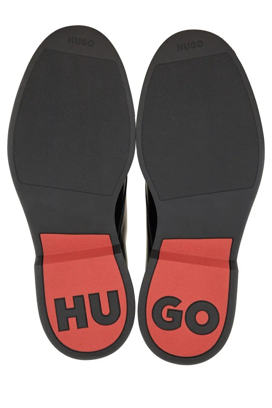 Black and red rubber soles with hugo branding on the heel of hugo boss men’s leather derby loafer black back view