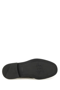 Black rubber sole with embossed hugo boss logo and textured tread on men’s leather derby loafer black