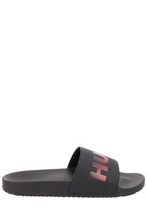 Hugo Boss men’s black hu slide sandal with gradient pink logo on the strap for casual wear