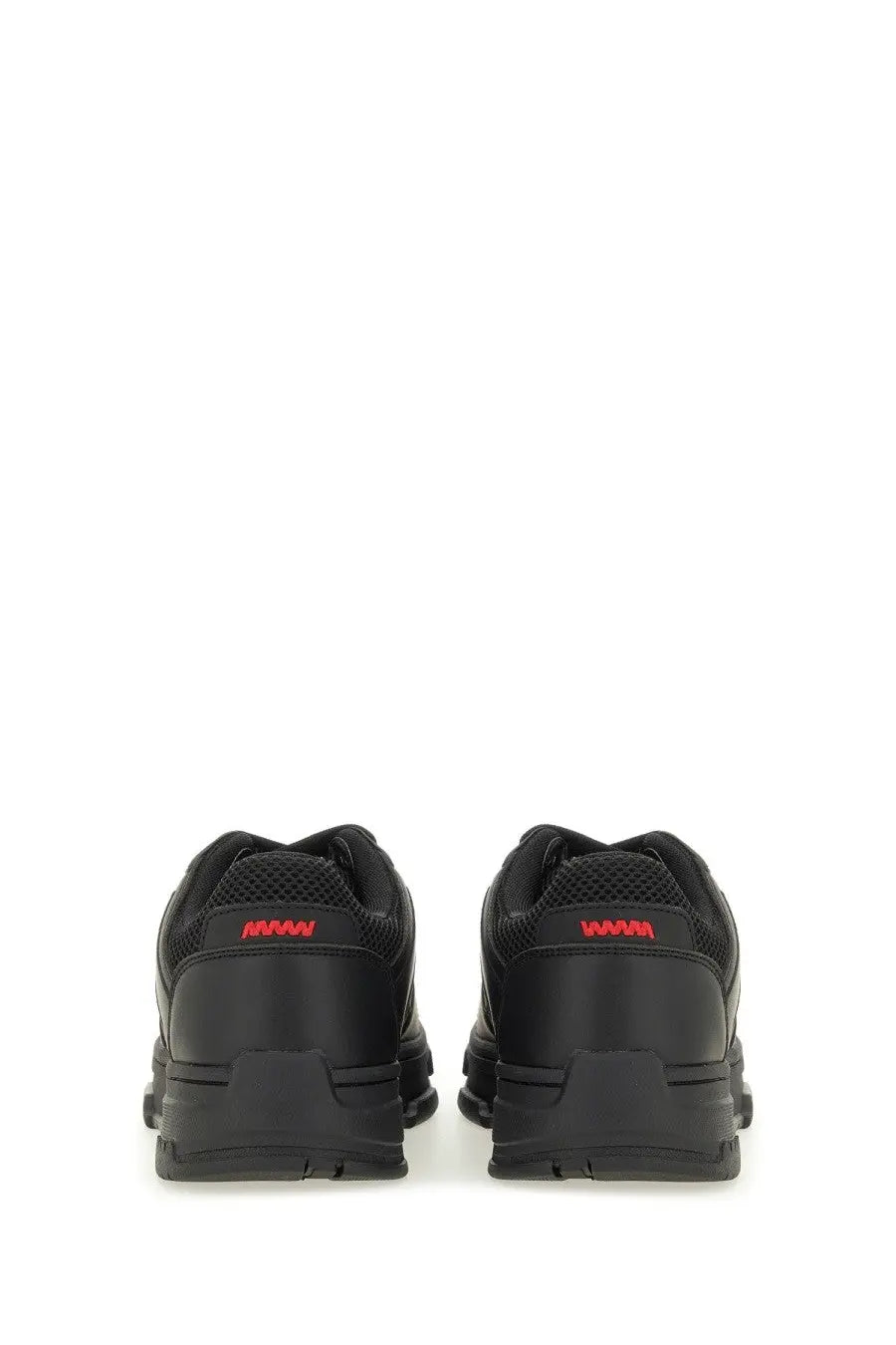 Back view of hugo boss men’s black athletic sneakers with red branding on the heel for casual wear