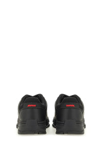Back view of hugo boss men’s black athletic sneakers with red branding on the heel for casual wear