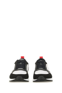 Hugo boss men’s sneaker grey in black and white leather with red heel tab shown from the back side