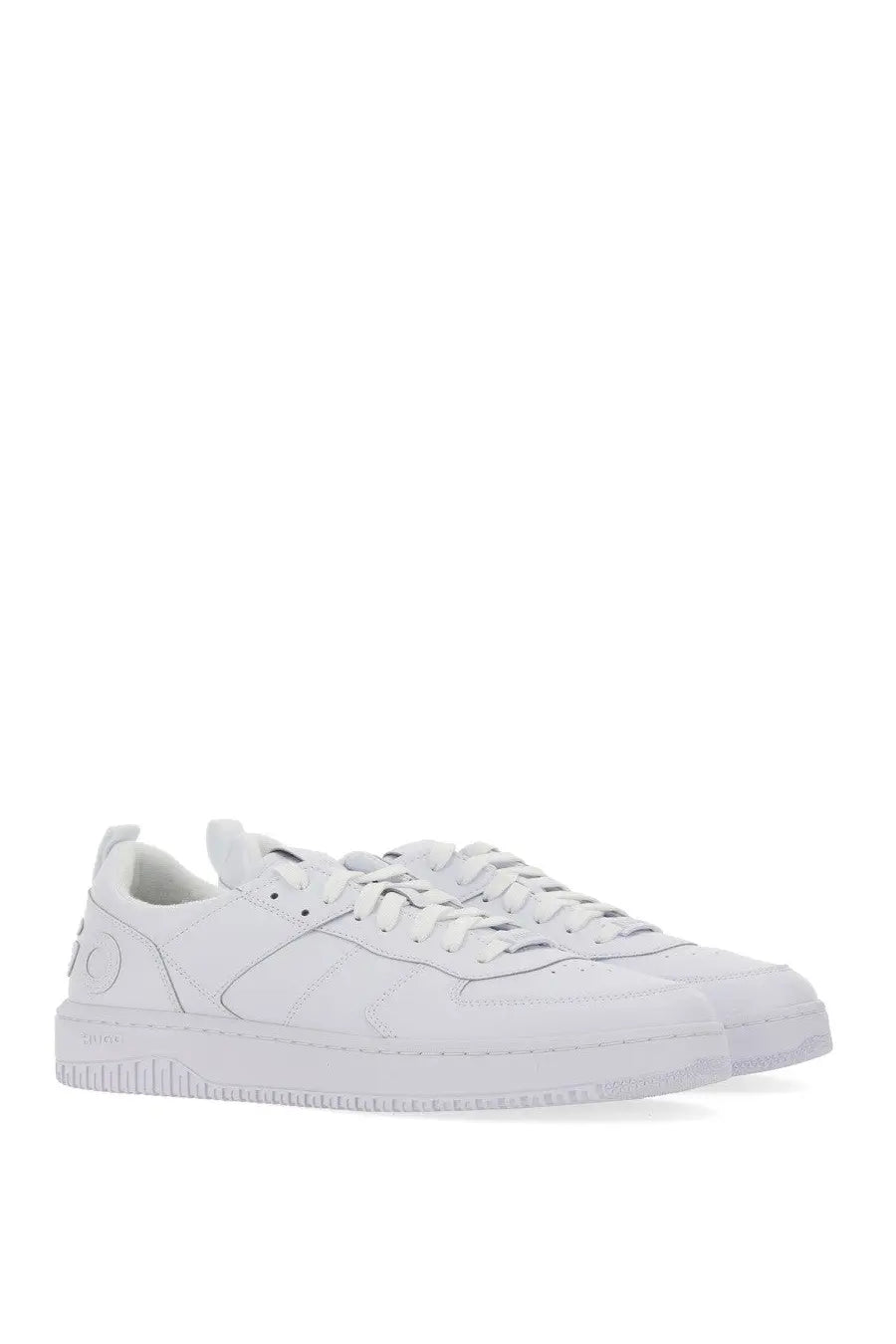 Hugo Boss men’s white leather sneakers with minimalist design and subtle branding on the side