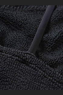 Black textured fleece hoodie with ribbed drawstring detail featuring Hunza G womens the original crinkle bikini black design