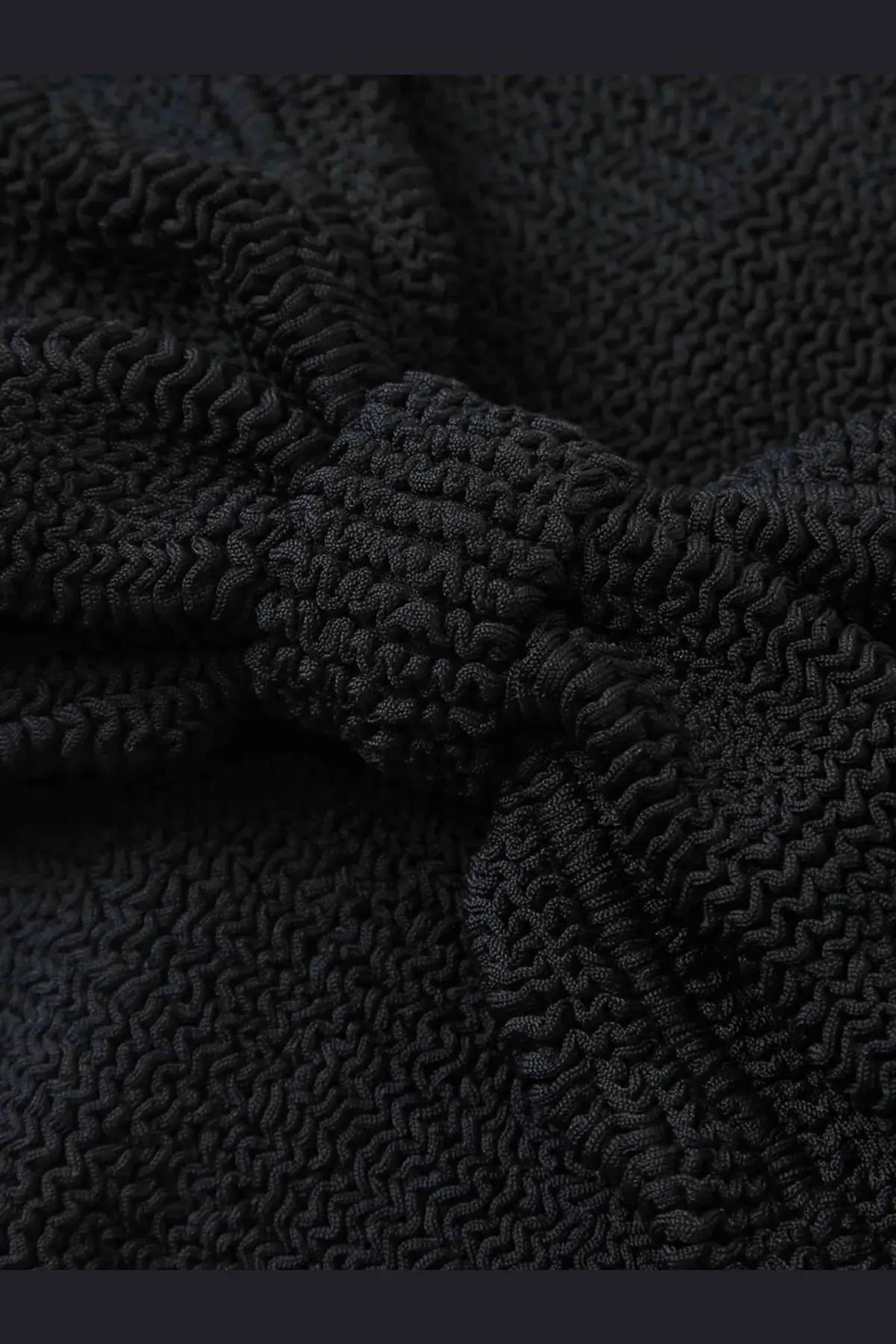 Black textured knit fabric with ribbed wavy pattern on hunza g womens the original crinkle bikini black