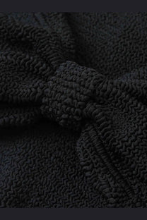Black textured knit fabric with ribbed wavy pattern on hunza g womens the original crinkle bikini black