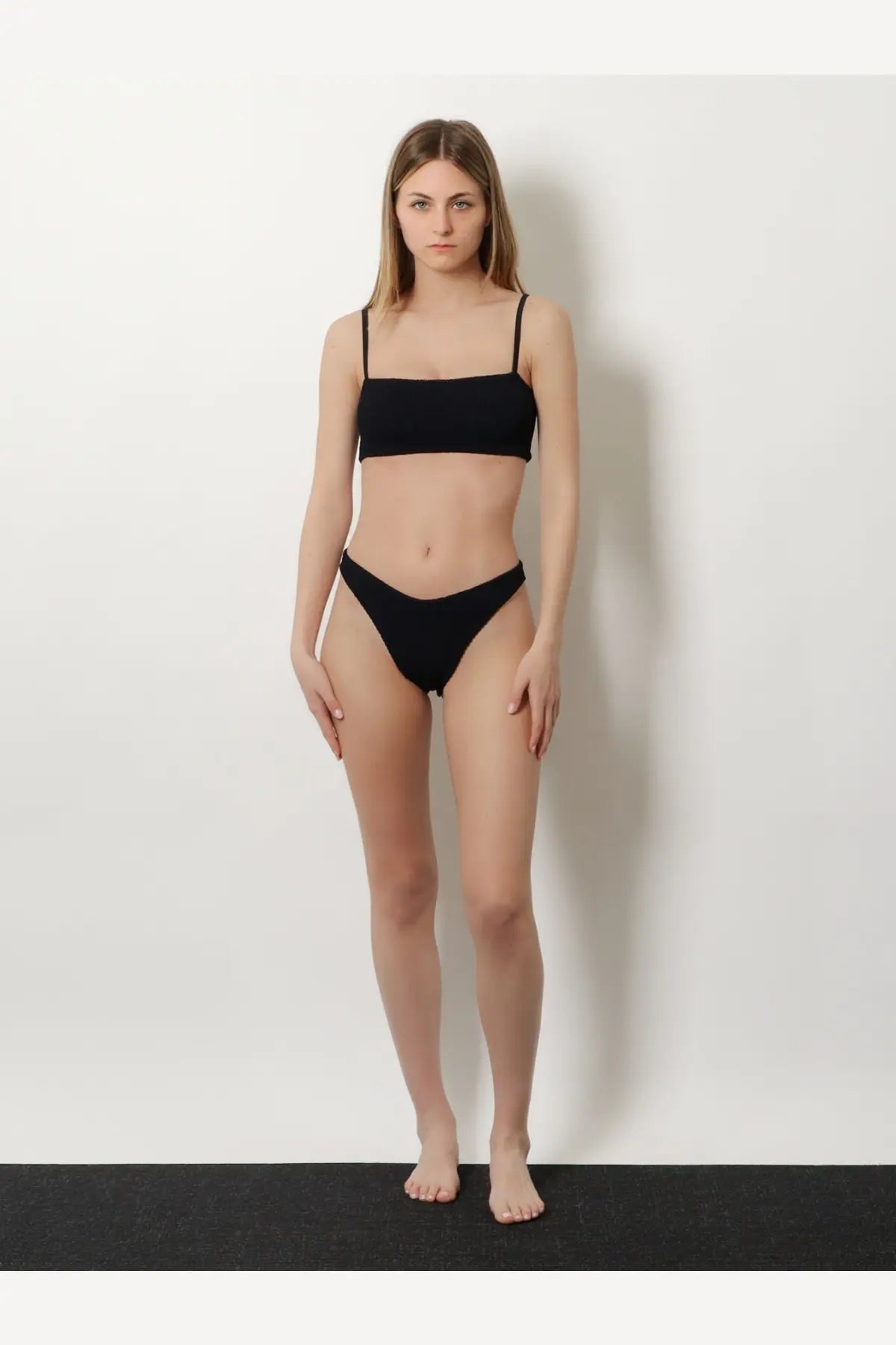Black two-piece crinkle bikini set with thin straps from hunza g featuring a minimalist design