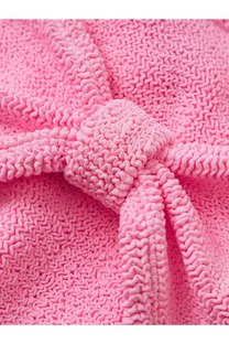 A soft vibrant pink knitted robe with a textured zigzag pattern and matching tied belt for comfortable wear
