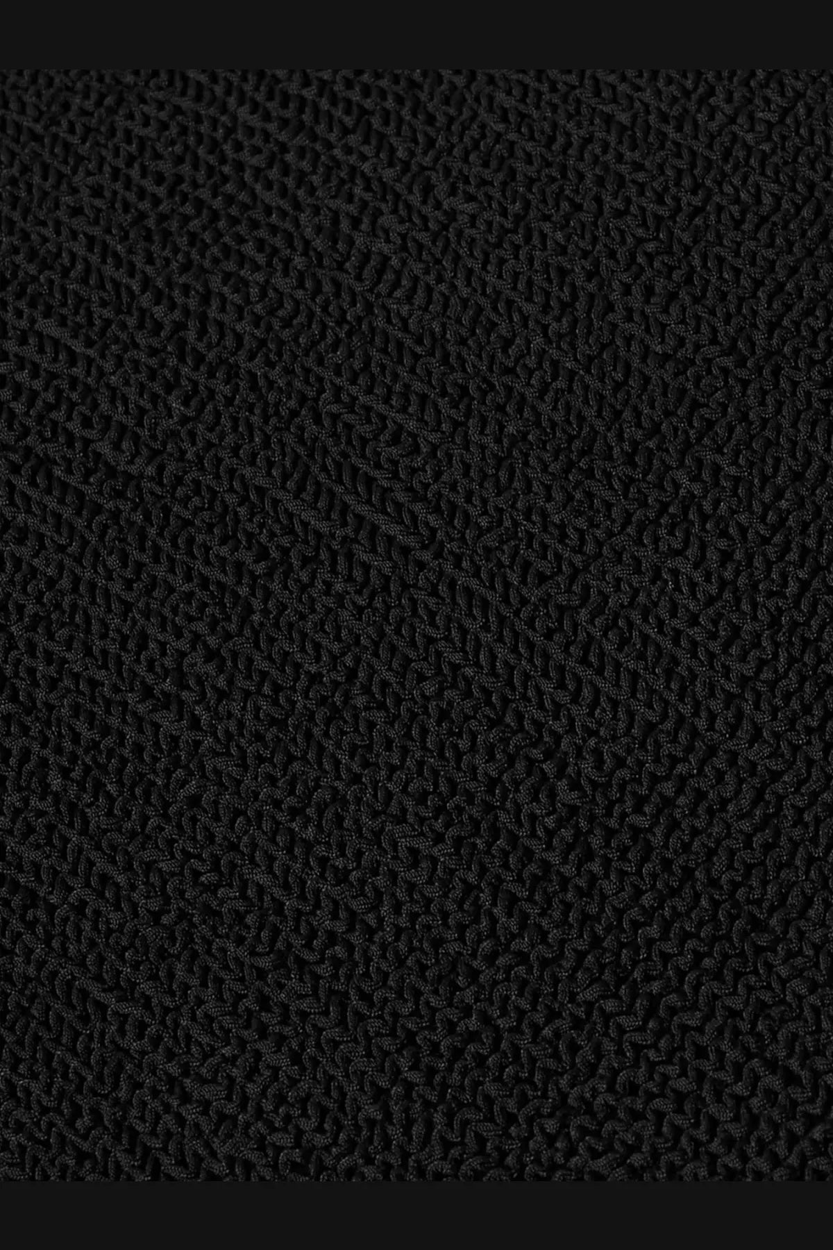 Black textured knit fabric with a consistent interlocking pattern from hunza g women’s the original crinkle dress black