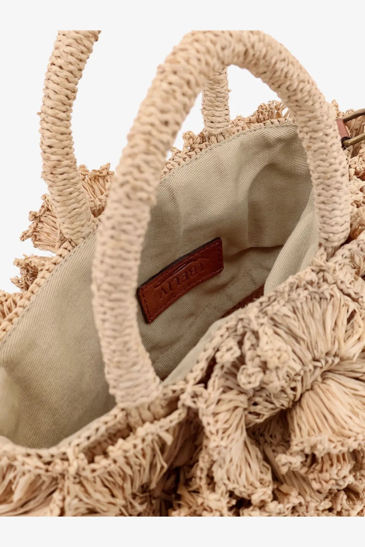 Beige woven straw tote bag with fringed tassels and leather brand tag from ibeliv women’s coral raffia crossbody bag tea