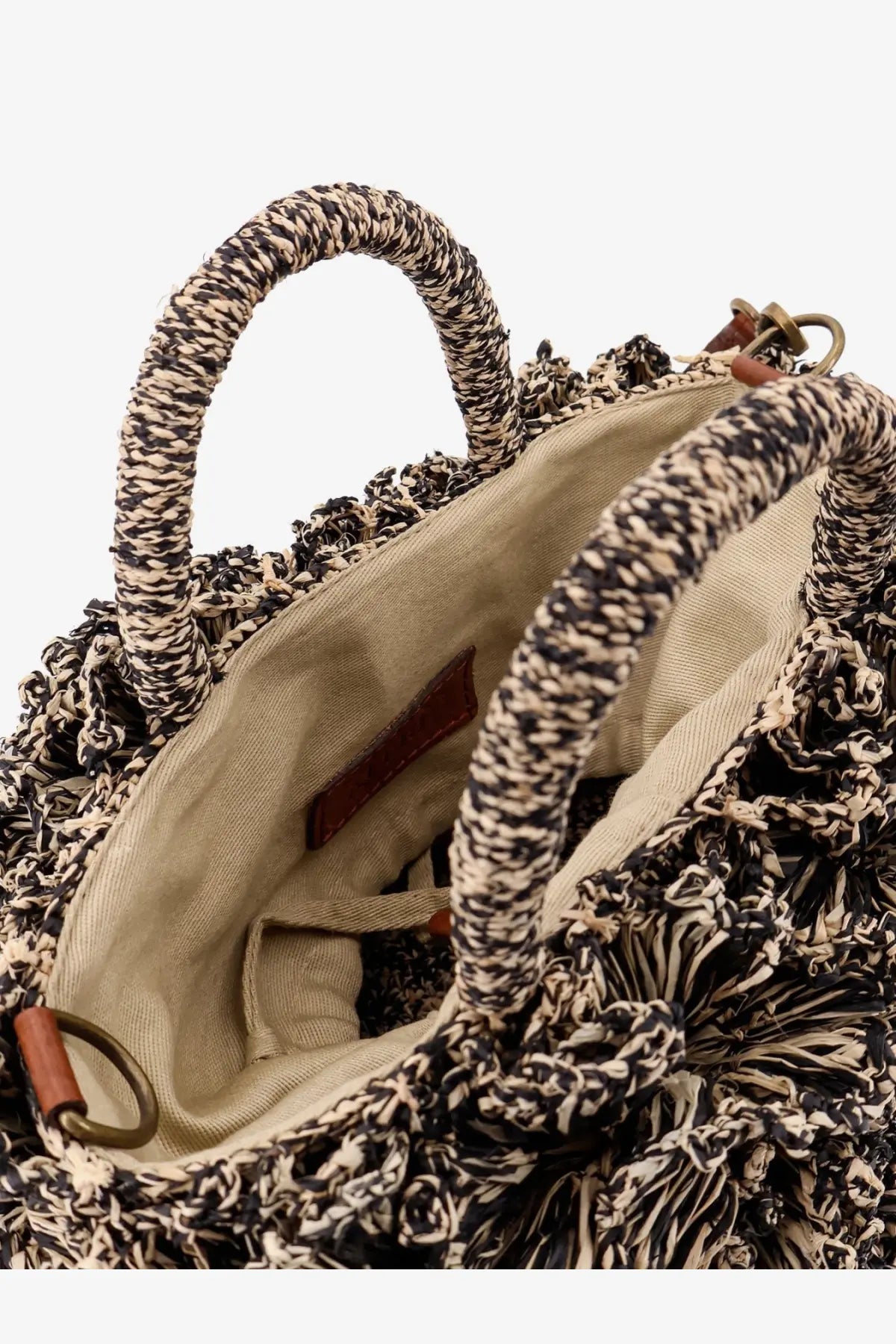 Ibeliv women’s coral raffia crossbody bag with handwoven black and beige rope handles and fringed detailing
