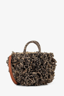 Ibeliv women coral raffia crossbody bag in brown with a textured woven ruffled flower exterior and braided handle