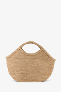 A beige woven straw hat with a wide brim and textured pattern paired with ibeliv women’s pure raffia shoulder bag tea