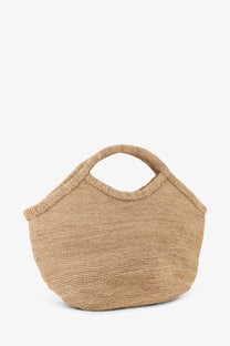 Beige woven straw tote bag with a structured slouched silhouette and dual top handles by ibeliv women’s pure raffia