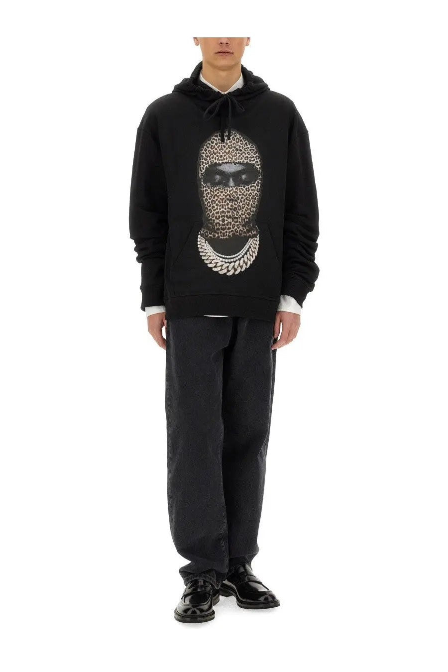 Ih nom uh nit men’s black hoodie with bold leopard print face graphic and silver chain necklace detail