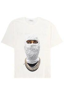 Ih nom uh nit men’s off-white short-sleeved t-shirt with graphic of person wearing glittery silver ski mask and gold chains