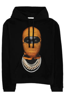 Ih nom uh nit men’s black hoodie with bold orange knit ski mask graphic and layered silver chain necklaces