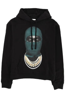 Ih nom uh nit men’s black hoodie with teal knit balaclava graphic and gold chain print on chest