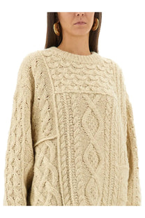 Isabel Marant Étoile women’s cream-colored cable-knit sweater with intricate braided patterns and oversized fit