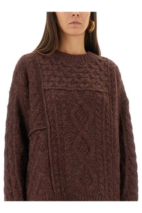 Isabel Marant Étoile women’s red chunky knit sweater with intricate cable patterns and cozy textured design