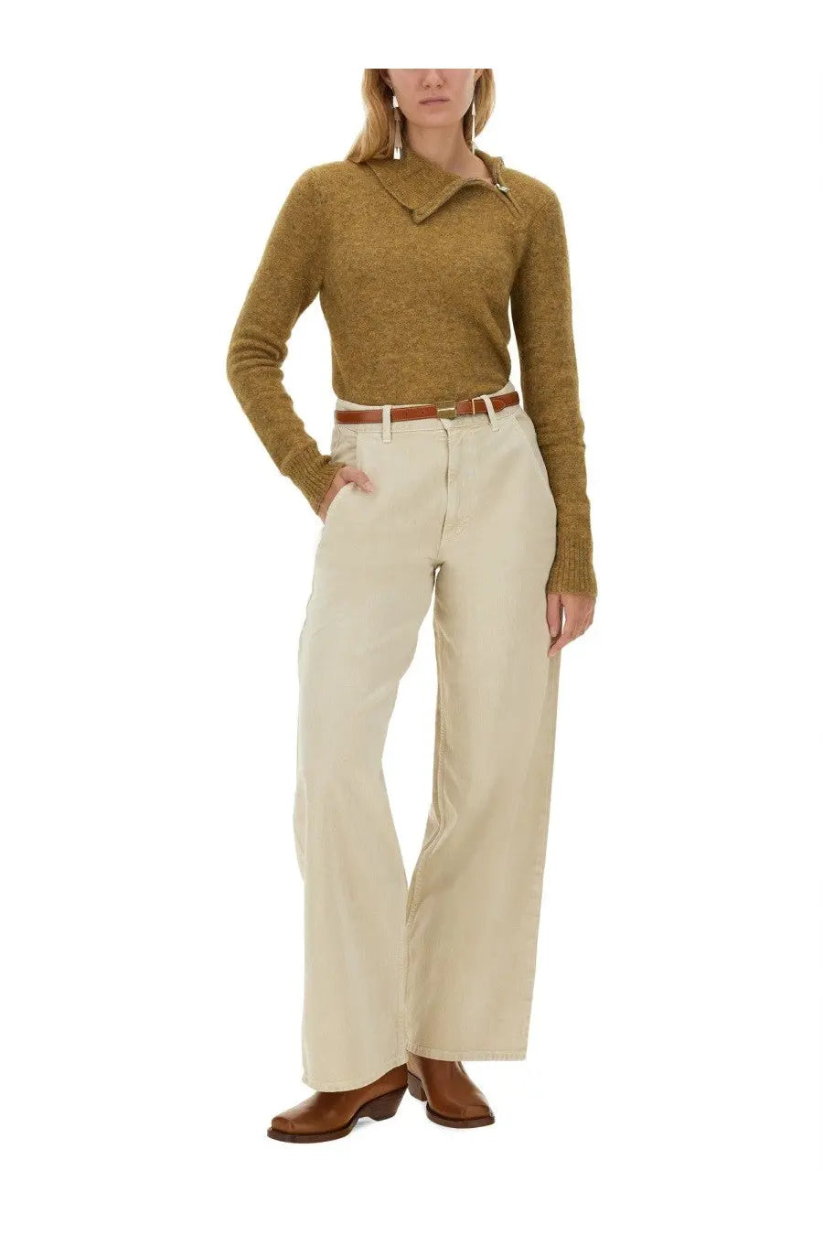 A mustard-yellow textured knit sweater with collar and zipper detail paired with Isabel Marant Étoile pink jeans