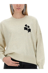 Beige oversized knit sweater with black abstract logo on chest from isabel marant étoile women’s jersey marisans grey collection