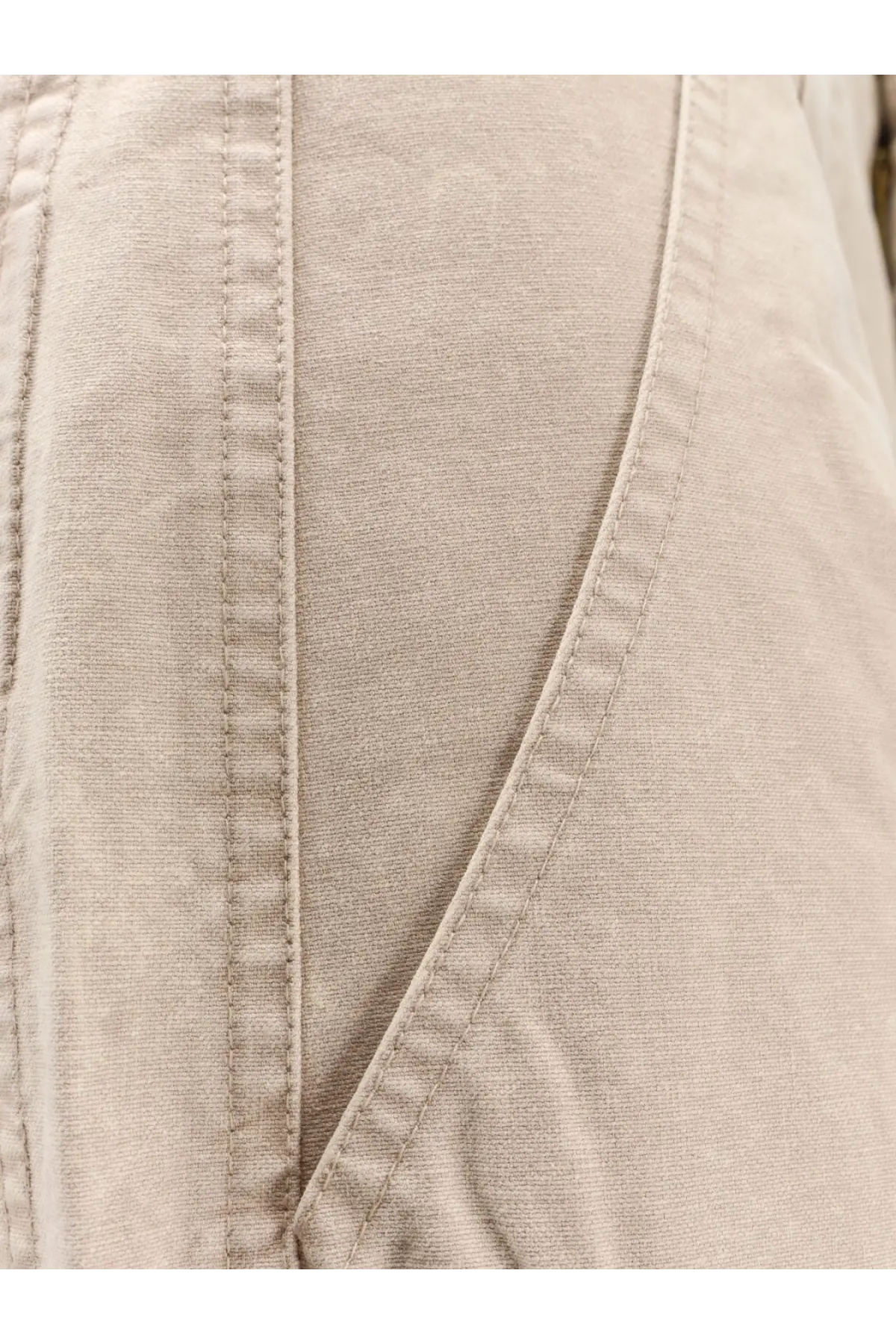 Beige linen jacket with subtle vertical stitching and soft textured weave paired with isabel marant étoile white denim trousers