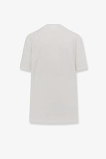White cotton t-shirt with relaxed fit and short sleeves paired with black linen shirt by isabel marant étoile
