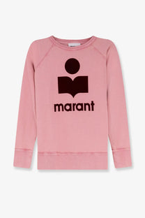 Pink marant sweatshirt in red organic cotton with dark brown graphic of figure holding book above brand name