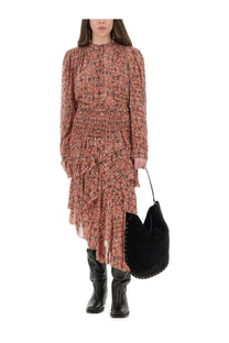A flowing tiered midi dress in soft terracotta with floral embroidery and smocked waist detailing by isabel marant étoile