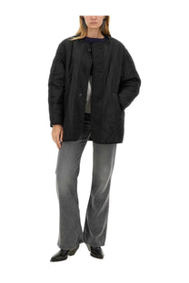 Black quilted puffer coat with relaxed fit front button closure from isabel marant étoile reversible jacket fernelia multicolor