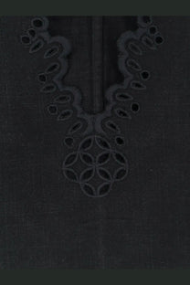 Black linen top by Isabel Marant Étoile with intricate embroidered detailing around the neckline