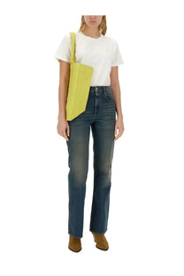 Bright yellow canvas tote bag with single shoulder strap paired with Isabel Marant Étoile women’s shirt Aby White