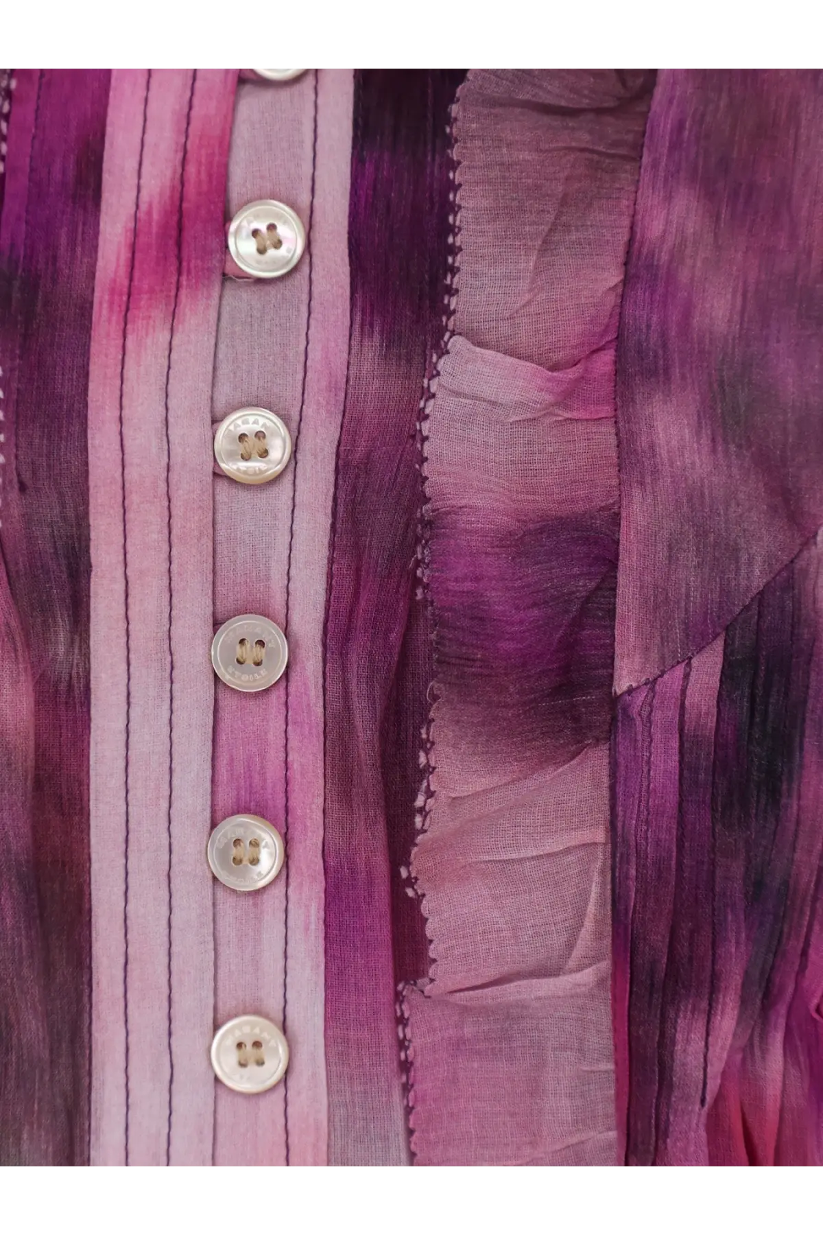 A row of five silver buttons with four holes on an isabel marant étoile veelia organic cotton tie-dyed shirt blue