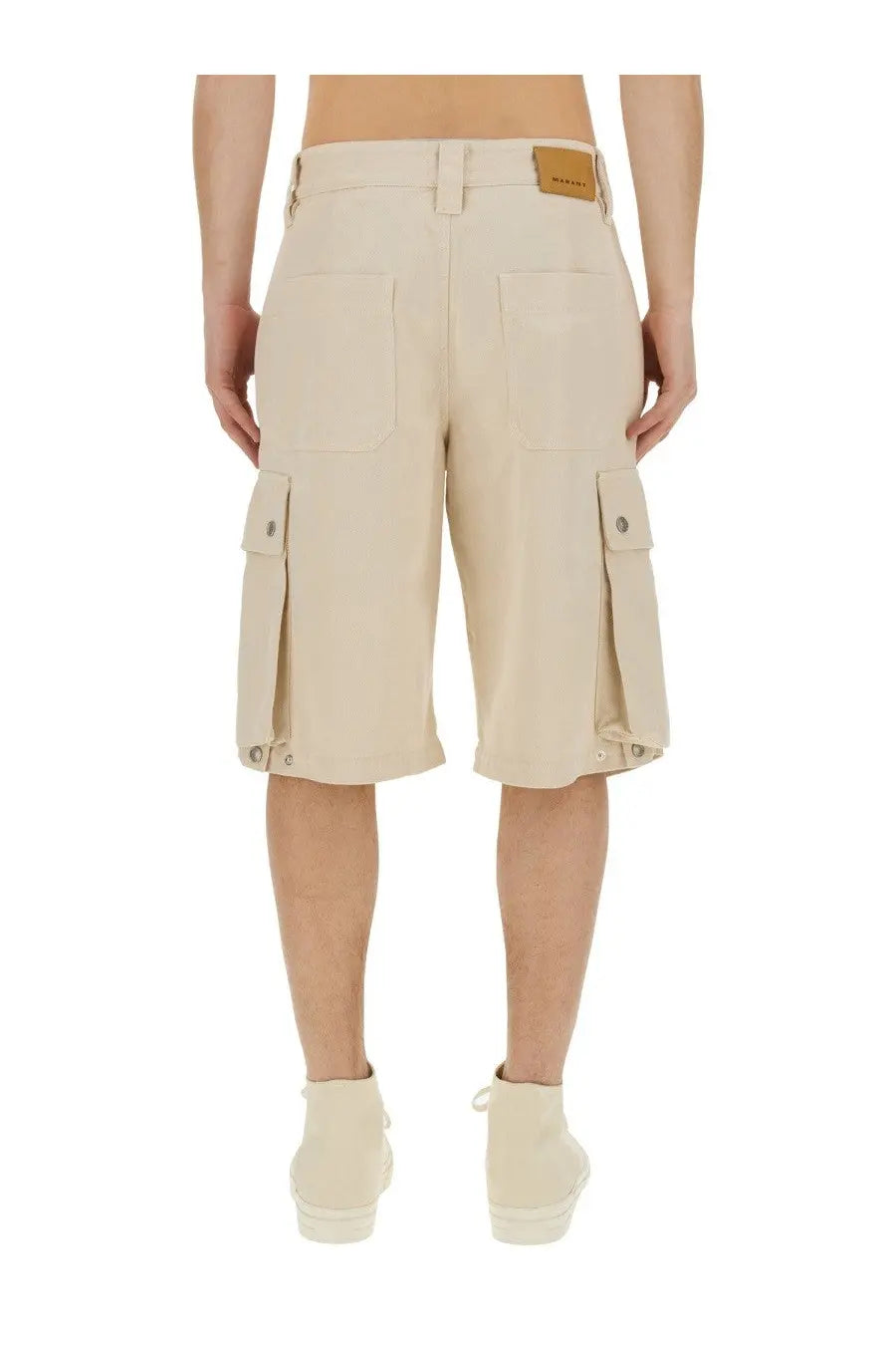 Beige cargo shorts with multiple pockets and leather brand patch at waistband from Isabel Marant men’s bermuda tejelo pink collection