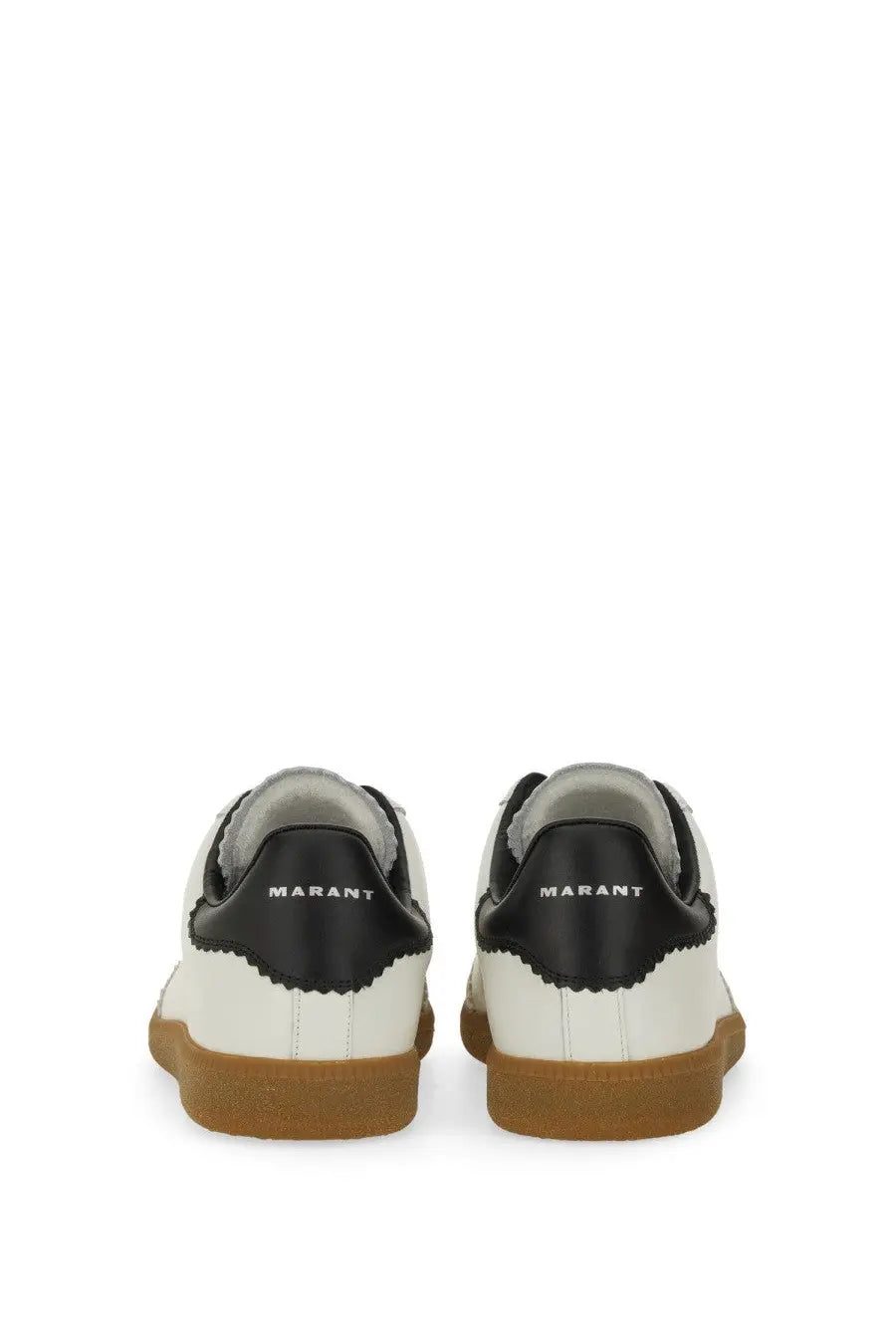 White and black leather isabel marant men’s brycy sneaker with tan rubber sole and marant logo on the heel back side