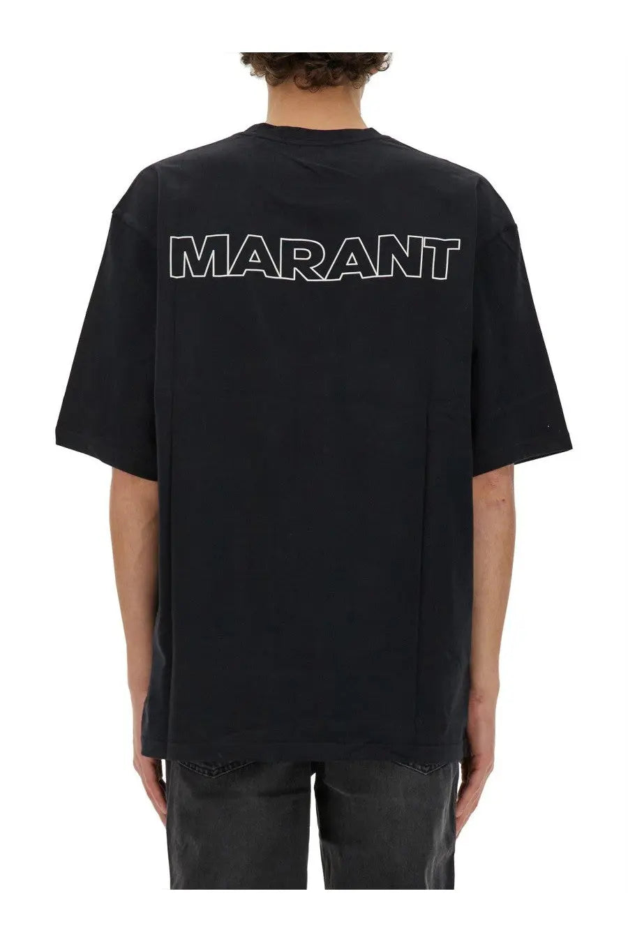 Black oversized isabel marant men’s guizy shirt showing bold white marant lettering across the back