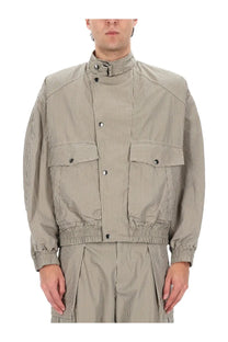 Isabel Marant men’s short jacket beige with black vertical stripes high collar buttoned flap pockets and elasticated cuffs