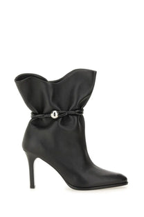 Isabel Marant women’s black leather ankle boot with ruffled upper and silver-toned buckle detail